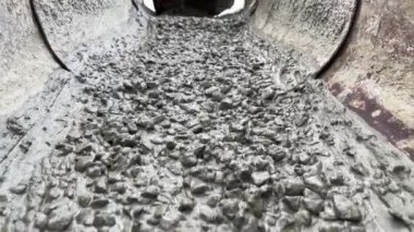 Pouring concrete mix on concreting form work. Forming, an essential part of the entire building process. Before concrete can be poured, forms need to be built to hold the concrete in place. Slow