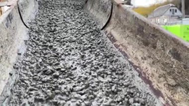 Pouring concrete mix on concreting form work. Forming, an essential part of the entire building process. Before concrete can be poured, forms need to be built to hold the concrete in place. Slow