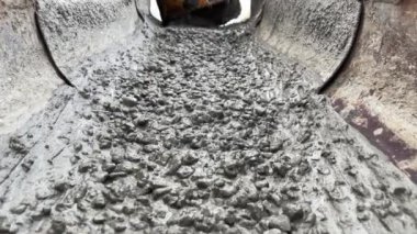 Pouring concrete mix on concreting form work. Forming, an essential part of the entire building process. Before concrete can be poured, forms need to be built to hold the concrete in place. Slow