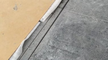 Tiling work. 4k video footage of the finished wall after tiling in a large bathroom