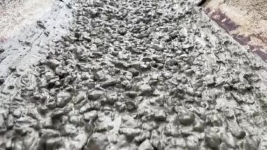 Pouring concrete mix on concreting form work. Forming, an essential part of the entire building process. Before concrete can be poured, forms need to be built to hold the concrete in place. Slow