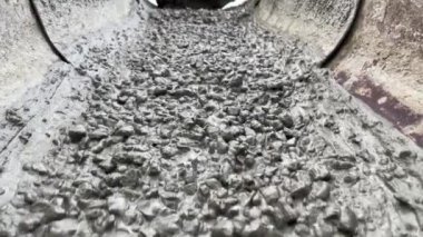 Pouring concrete mix on concreting form work. Forming, an essential part of the entire building process. Before concrete can be poured, forms need to be built to hold the concrete in place. Slow