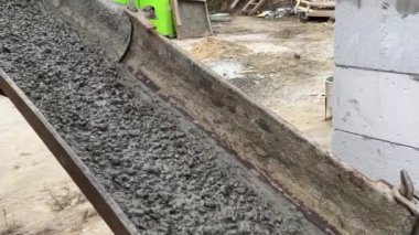 Pouring concrete mix on concreting form work. Forming, an essential part of the entire building process. Before concrete can be poured, forms need to be built to hold the concrete in place. Slow
