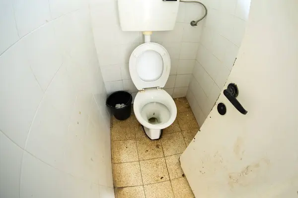 stock image dirty toilet in a public park, problems with cleaning, dirty people