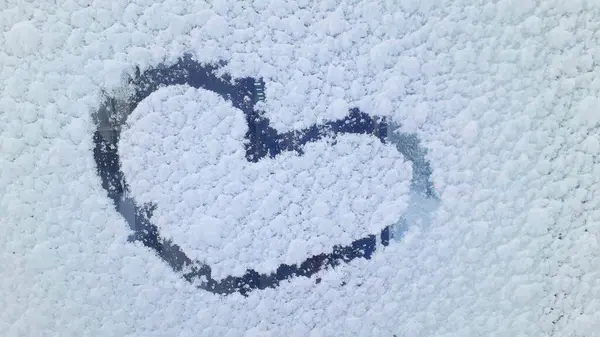 heart in snow, copy space. Love concept