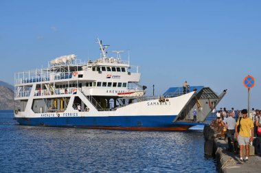 Paleochora, August 6, 2022: Ferry parked at pier of Paleochora town in Crete island, Greece