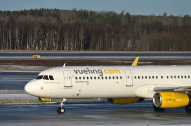 Stockholm, Sweden - February 13: Vueling Airlines Airbus A321-231 airplane on February 13, 2023 in Stockholm, Sweden clipart
