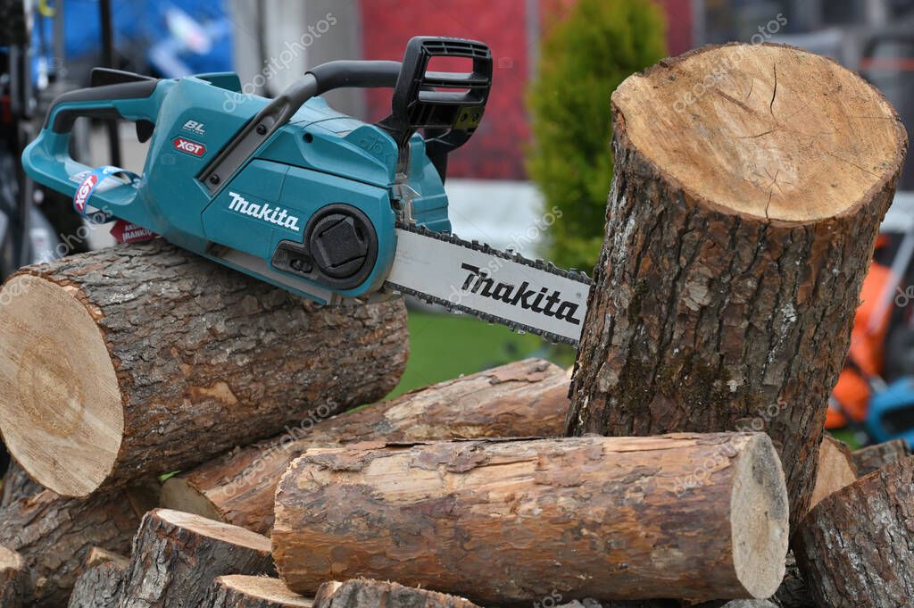 Kaunas, Lithuania - March 30, 2023: Professional electric Makita brand cordless chain saw for sale in Kaunas, Lithuania.