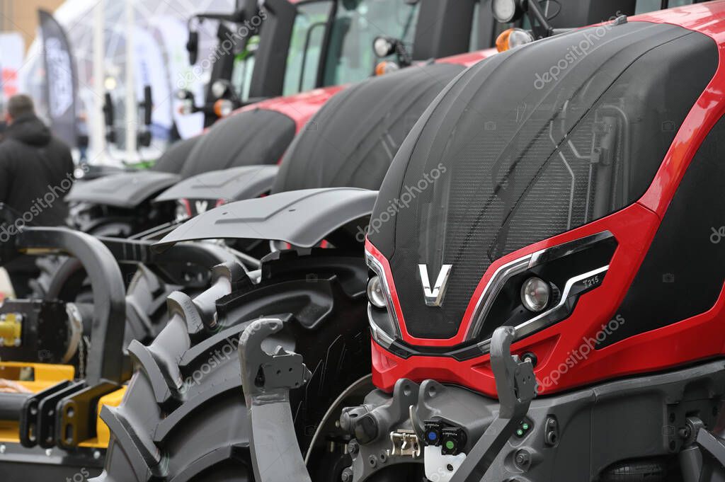 Kaunas, Lithuania - March 30, 2023: close up to Valtra tractor vehicle at International Agricultural show in Kaunas, Lithuania.