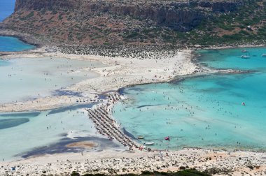 Crete, August 8, 2022: People relaxing at Balos beach in Crete, Greece on 8 August 2022. Balos beach is one of a famous beach in the Crete island.