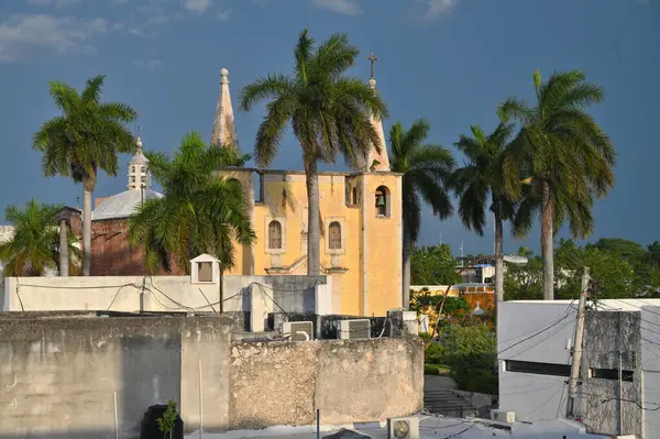 Church El Jesus during sunset with beautiful palm tree shadows, Merida, Yucatan, Mexico