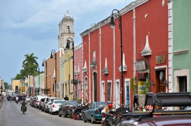 Mexico, Valladolid - july 19, 2023: Unidentified people on a colorful narrow street in the center of Valladolid, Yucatan, Mexico clipart