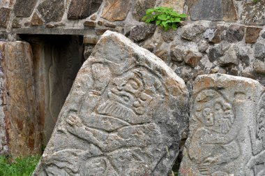 Monte Alban, Mexico - July 10, 2023: Stone carving of danzante in Monte Alban ruins on plateau Monte Alban in Mexico, Oaxaca, Mexico. clipart