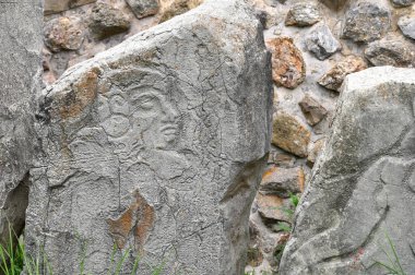 Monte Alban, Mexico - July 10, 2023: Stone carving of danzante in Monte Alban ruins on plateau Monte Alban in Mexico, Oaxaca, Mexico. clipart