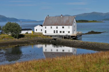 Norway, Sortland - August 09, 2023. Jennestad handelssted (Jennestad Trading Post) building in Sortland, Norway. clipart