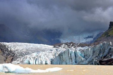 Icebergs at the glacier lagoon Fjallsarlon, Southern Iceland clipart