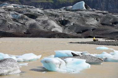 Icebergs at the glacier lagoon Fjallsarlon, Southern Iceland clipart