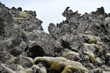 İzlanda 'nın İzlanda Dağları, İskandinavya' da bir lav alanında volkanik kül ve lav oluşumları