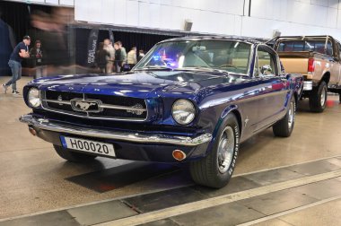 Vilnius, Lithuania - April 04, 2025: American muscle car Ford Mustang in Vilnius, Lithuania. Car exhibition Classic Auto in Vilnius, capital of Lithuania
