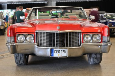 Vilnius, Lithuania - April 04, 2025: Front view of vintage classic American car Cadillac in Vilnius, Lithuania. Car exhibition Classic Auto in Vilnius, capital of Lithuania