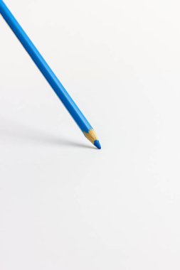 Multicolored art pencils on a white background. For professional artists, crafters, handmade. Production of paintings, drawings and children's creativity.