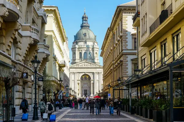 stock image Budapest, Hungary- March 03, 2024: a view of St. Stephens Basilica from Zrinyi utca pedestrian street, Szent Istvan Bazilika in Budapest