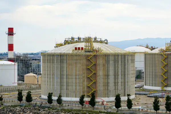 stock image LNG gas terminal large storage reservoirs in Barcelona port, liquefied natural gas supply, energy source diversification