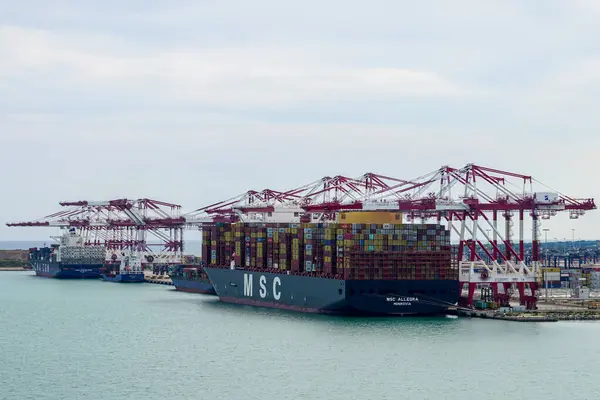 stock image Barcelona, Spain- May 25, 2024: large, high, fully loaded container ship MSC Allegra , IMO 9897028, at port container terminal