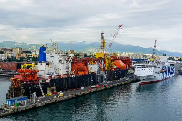 stock image Genoa, Italy- May 27, 2024: LNG tanker FSRU Toscana moored at Genoa port, the world's first offshore-moored floating, storage and re-gasification unit