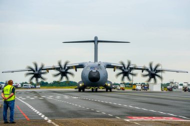 Liepaja, Latvia- June 16, 2024: ZM401 RAF Royal Air Force Airbus C.1 A400M Atlas, military cargo aircraft on the airport runway clipart