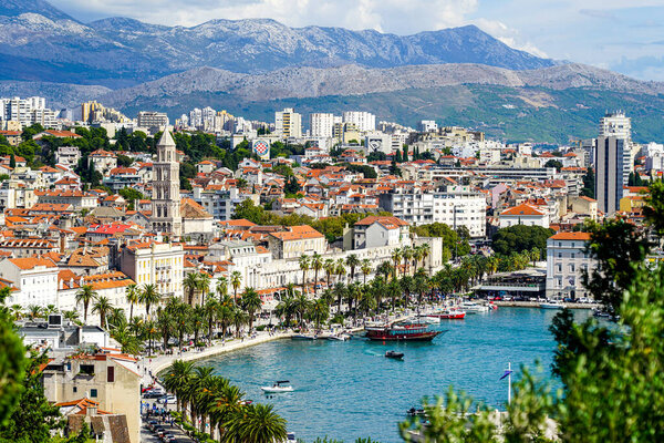 Split, Croatia - September 20, 2024: aerial view of old town of Split dominated by Riva waterfront promenade and belltower of Saint Domnius cathedral,