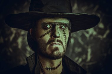 The ghost of an old, cursed cowboy from the Wild West with scars on his face, wearing a black leather hat and black coat. The hero of an adventure novel, horror. Vintage style. Fantasy. Halloween.  clipart