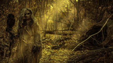 A terrible forest sorcerer with a canvas bag on his head and in a sackcloth robe stands in a dense forest with a black raven on his hand. Scarecrow. Halloween Tales. Horror, thriller. Copy space.  clipart