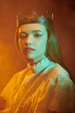 Peri masallarındaki prenses. Güzel, gururlu bir ortaçağ prensesinin portresi. Koyu kırmızı stüdyo geçmişi. Fantezi.