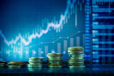 Coins stack and stock market investment graph,concept of business investment and stock future trading. clipart