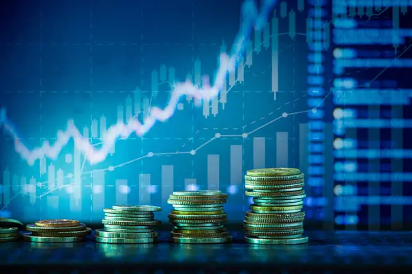 Madeni paralar yığını ve borsa yatırım grafiği, iş yatırımı konsepti ve gelecekteki borsa ticareti.