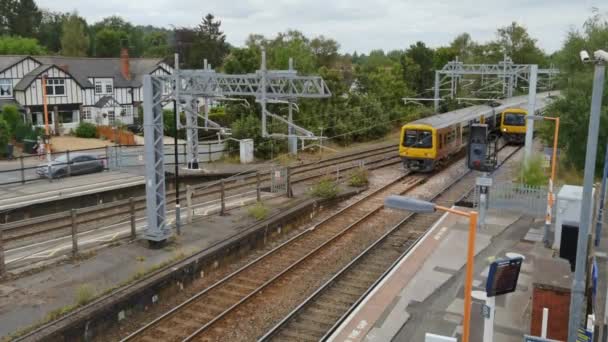 Electrified Passenger Commuter Freight Trains Passing West Midlands Worcestershire England — Stock Video