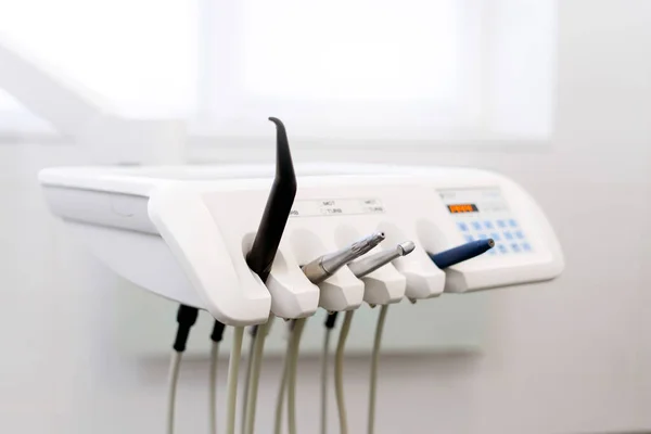 Dental office, where there are dental instruments for painless treatment of teeth.