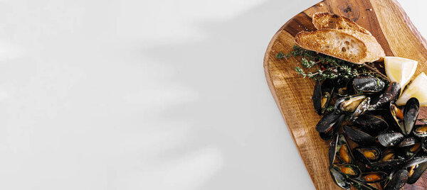 Fresh Mussels Wooden Plate Herbs Lemon Stock Photo