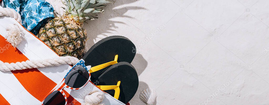 Beach Bag Pineapple Sunglasses Swimsuit White Sand Beach Stock Picture