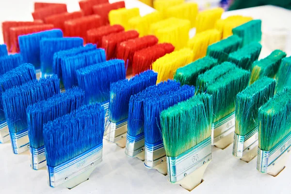 Colored construction paint brushes