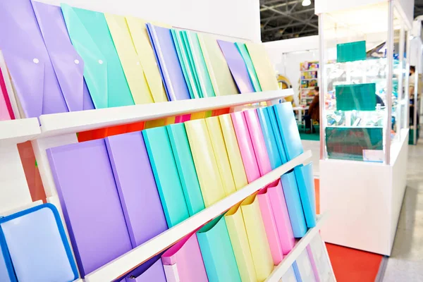 Colored plastic folder for papers in the stationery store