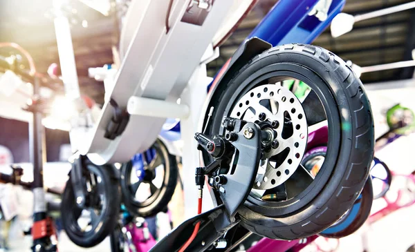 stock image Scooter disc brake wheel in sporting goods store