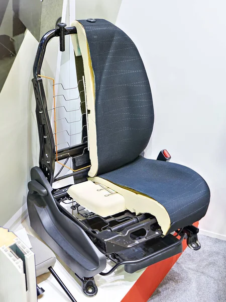 Car seat in cutaway at an exhibition in a store