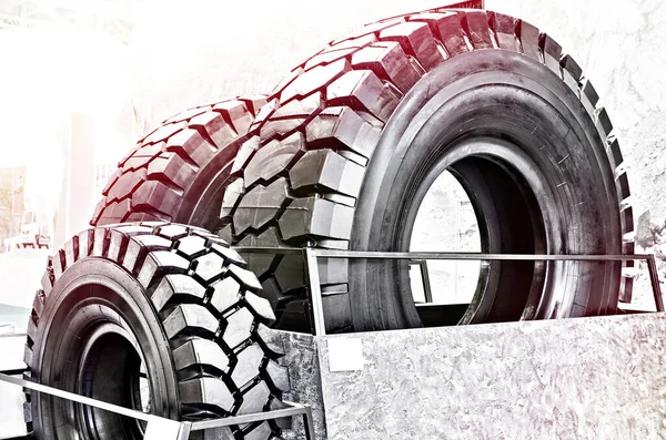 Dump truck and tractor tires in store