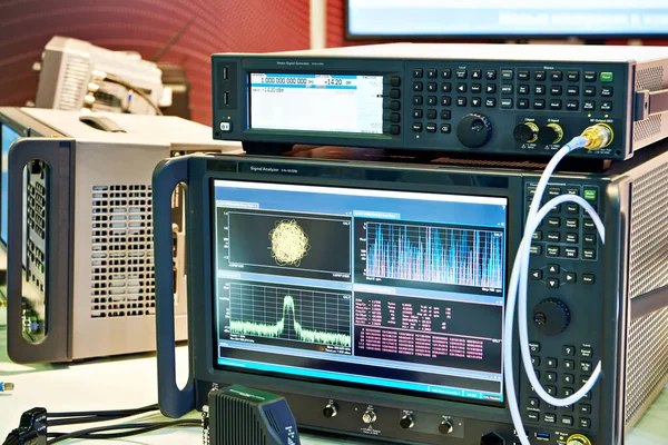 Spectrum analyzers and signal generator in laboratory