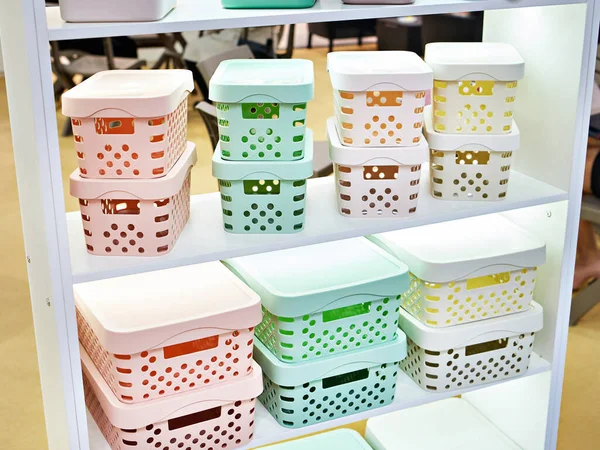 Plastic containers in the store of household goods