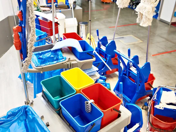 Cleaning trolleys and buckets in store exhibition