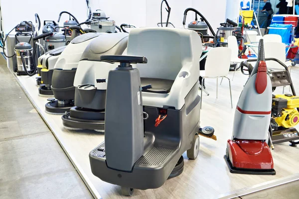 Compact walk-behind scrubber-drier machines in store