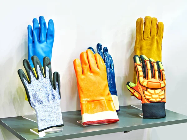 Household gloves for workers and builders in the store